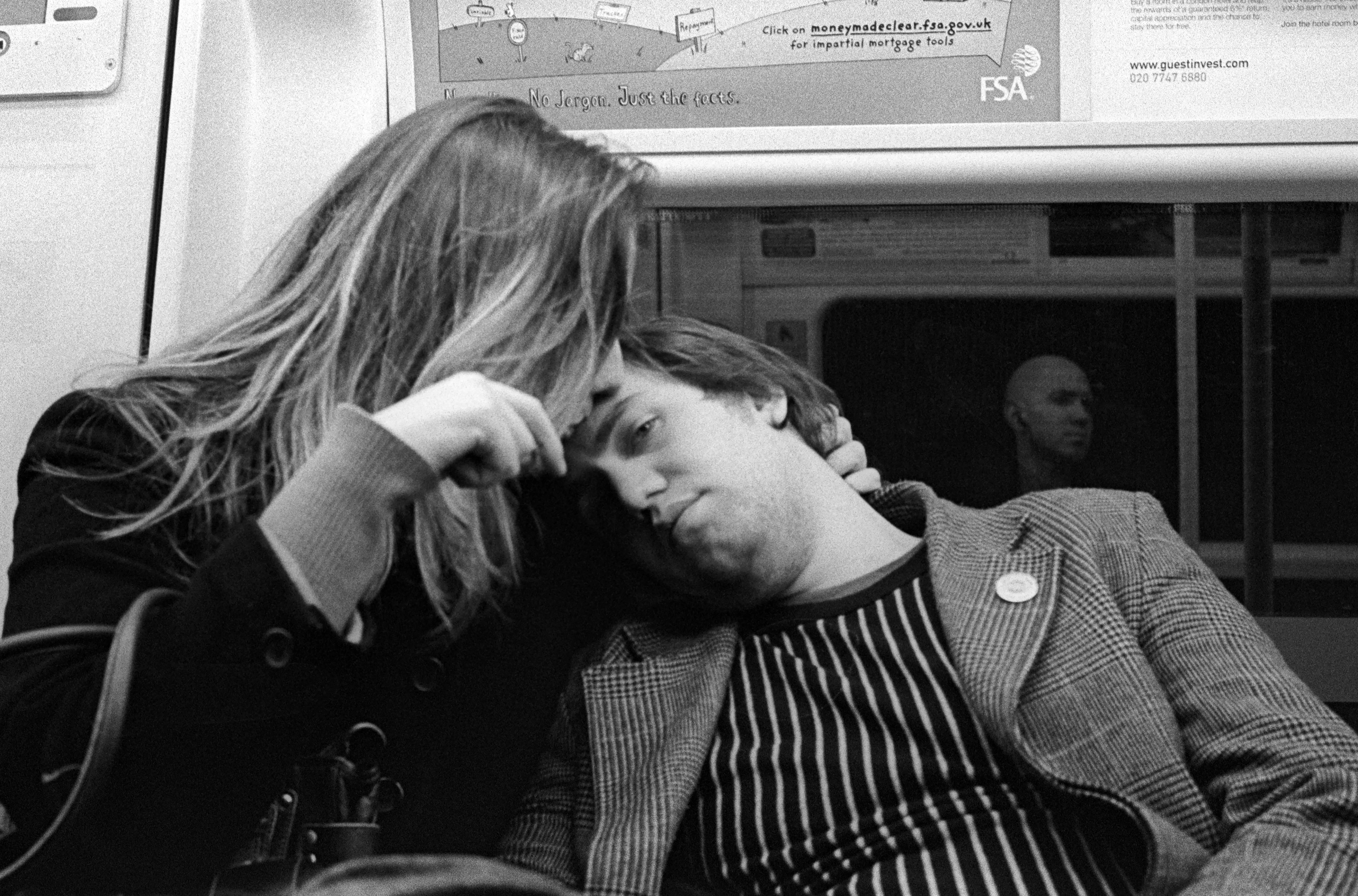 A passenger caught in a candid, unguarded moment on the Underground.