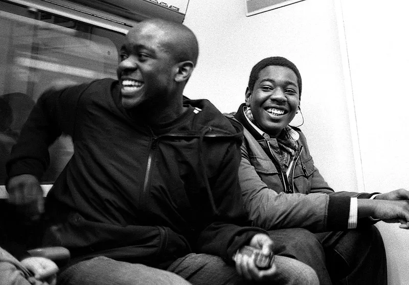 A self-conscious passenger acutely aware of being watched on the Underground.